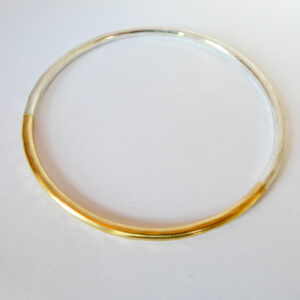 Eclipse Bracelet; 3mm round 22ct gold and fine silver. Internal diameter 67mm