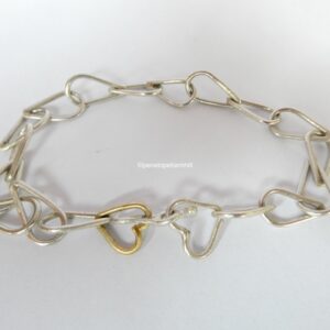 Two hearts bracelet, silver and 18ct gold.