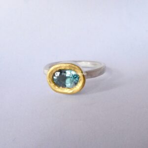 Brazilian Aquamarine Empress Ring; silver, 24ct gold. Size O