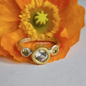 Chloris Ring; danburite and unheated sapphires. Silver and 24ct gold, size N 1/2