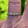 Buds in a row; tsavorite garnets, diamond, silver and 24ct gold. Size L 1/2 - Image 3