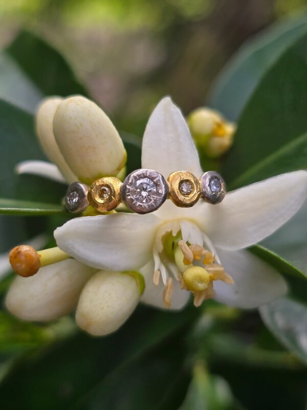 Buds in a Row; 18ct and 24ct gold, silver, natural yellow and white diamonds. Size M 1/2