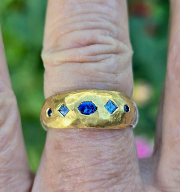 Eclipse ring with Ceylon sapphires in 24ct gold and silver. Size Q