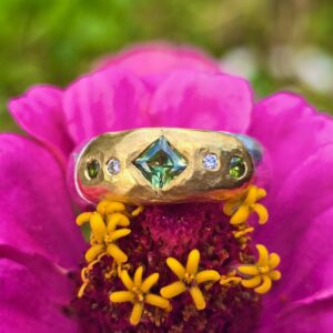 Eclipse ring, princess and brilliant unheated sapphires and E SI diamonds. Size P