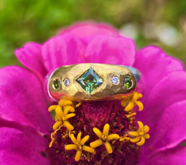 Eclipse ring, princess and brilliant unheated sapphires and E SI diamonds. Size P