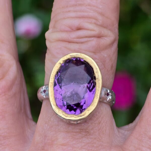 Empress ring, 15x11mm Brazilian amethyst with green sapphire and ruby. Silver and 24ct. Size P