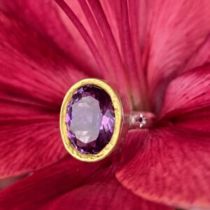 Empress ring, 15x11mm Brazilian amethyst with green sapphire and ruby. Silver and 24ct gold. Size P