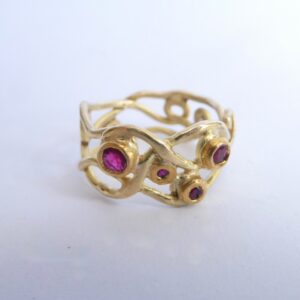 Heart vine ring; 18ct and 24ct gold with rubies.