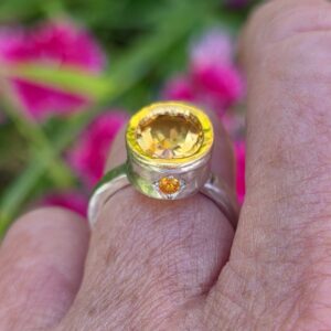 Empress Ring; 11mm x 9mm citrine, orange sapphires, 24ct gold and silver. Size P 1/2