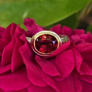 Contessa Ring; 10x8mm African garnet, silver and 24ct gold. Size P