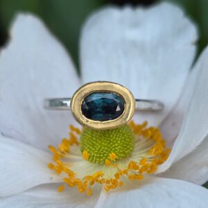Empress ring; teal green sapphire, silver, 24ct gold with sapphires. Size  M