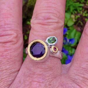Budding ring, amethyst, tourmaline and sapphire in silver and 24ct gold. Size P 1/2